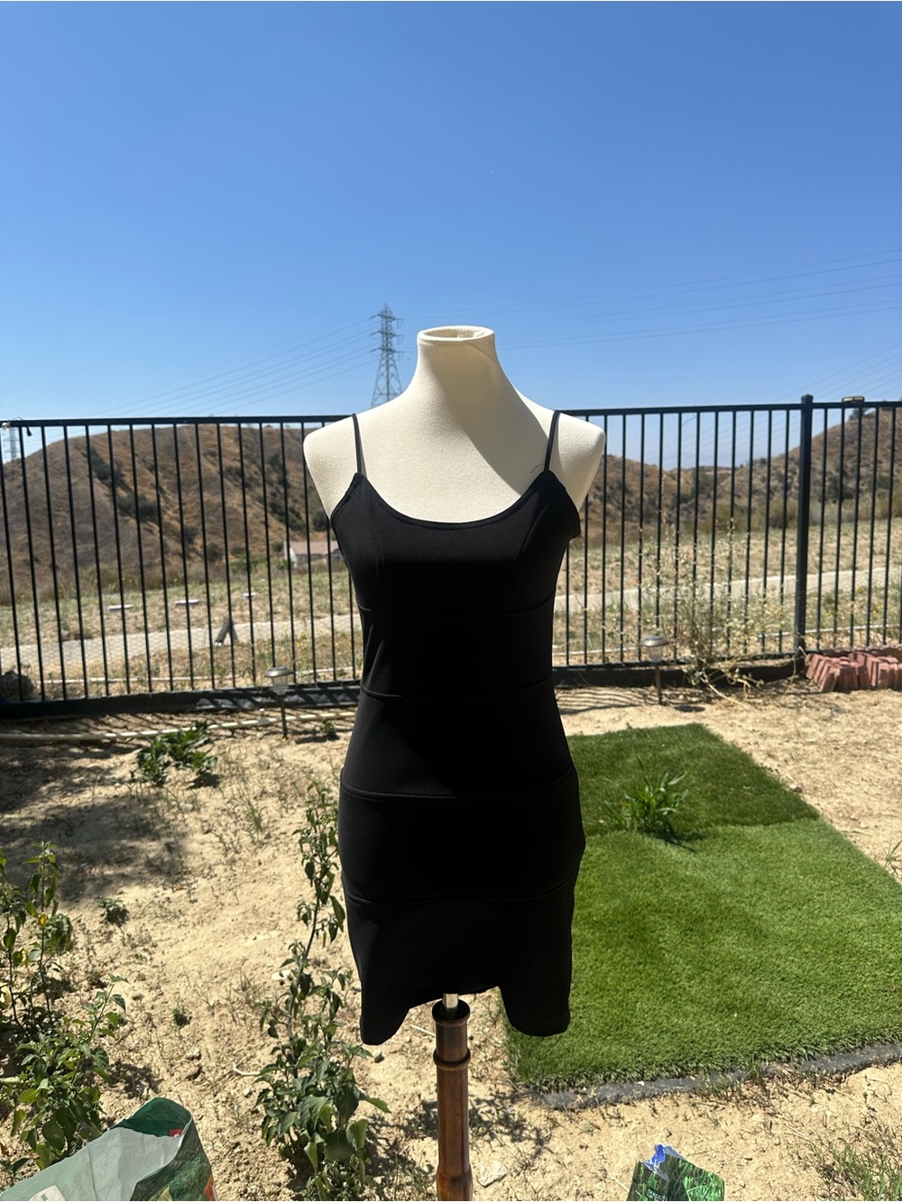 Vintage Too This Form-Fitting Black Mini Dress with Spaghetti Straps